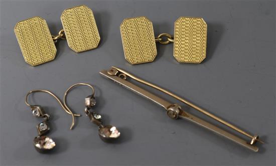 A pair of engine-turned 18ct gold cufflinks and two other items,